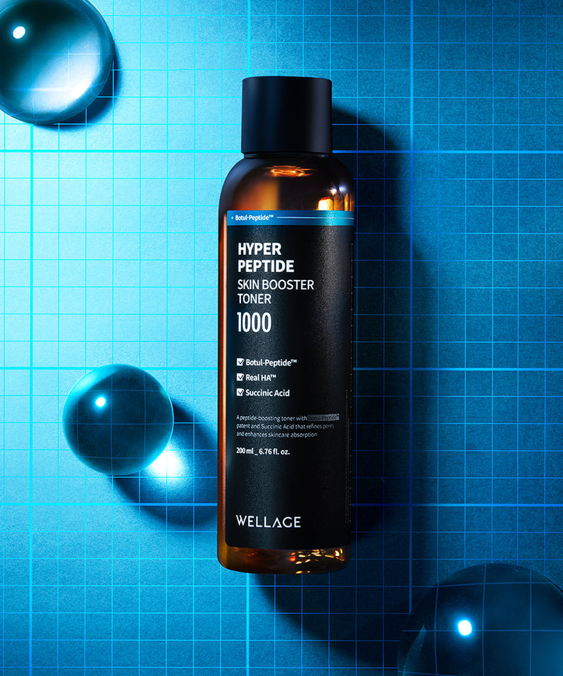 WELLAGE Hyper eptide Skin booster Toner 200ml sur fond bleu avec gouttes d'eau élégantes.