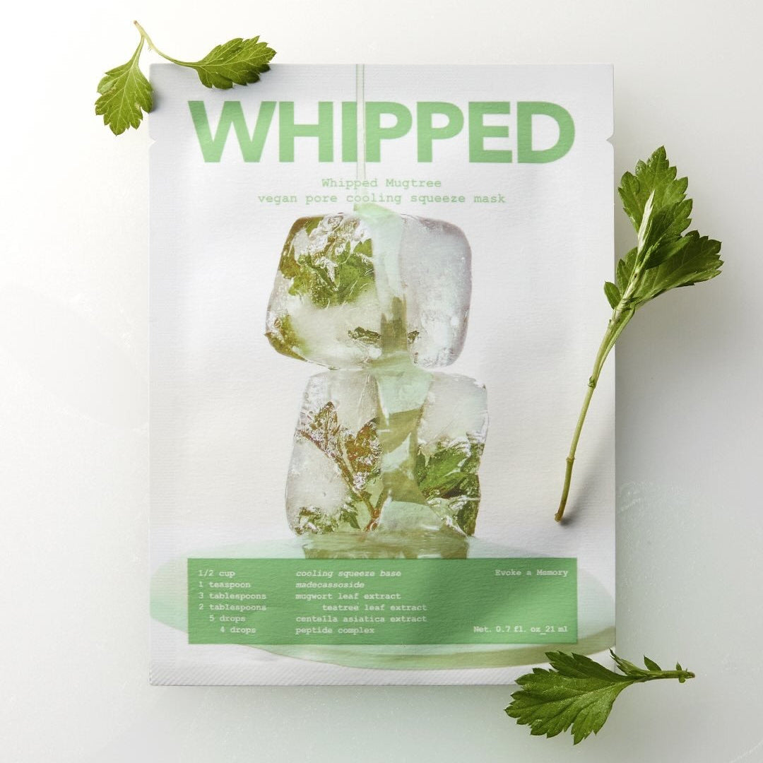 WHIPPED Mugtree Vegan Pore Cooling Squeeze Mask 1ea, pack de masque vert sur fond blanc avec feuilles décoratives.