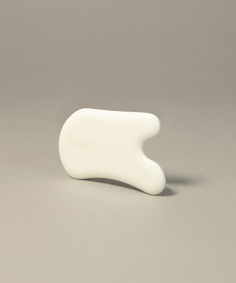XOUL Shelling Stone Brackets - Accessoire élégant et fonctionnel en pierre blanche pour soins de la peau, design moderne minimaliste.