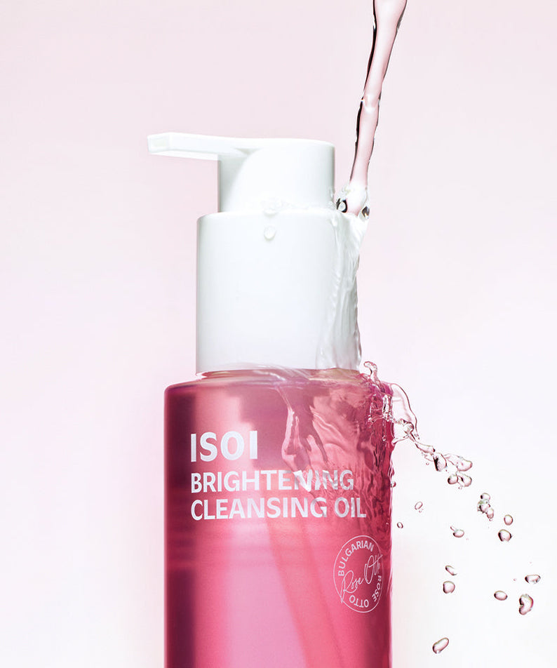 ISOI Brightening Cleansing Oil 150ml, huile démaquillante éclaircissante, flacon de 150 ml avec pompe, fond rose élégant.