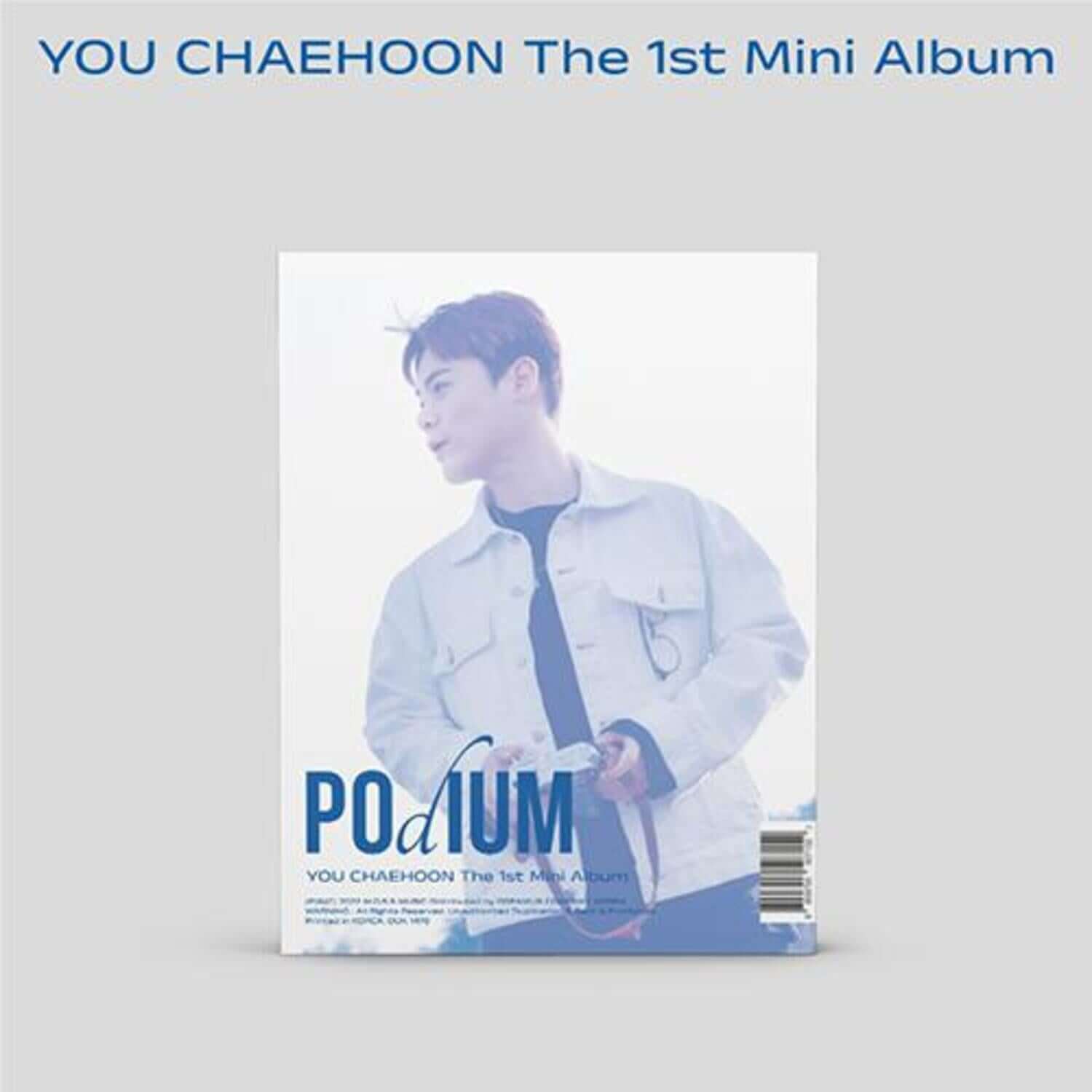 YU CHAEHOON - 1st [Podium] - Album Kpop, pochette avec photo du chanteur sur fond clair, édition officielle.