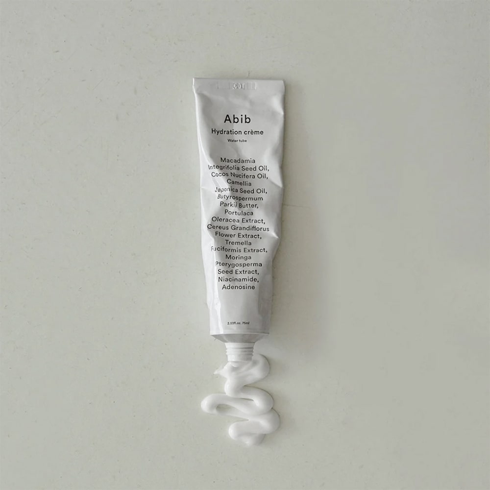 ABIB Hydration Crème Water Tube 75ml, crème visage Abib sur fond clair, tube et texture en surimpression.