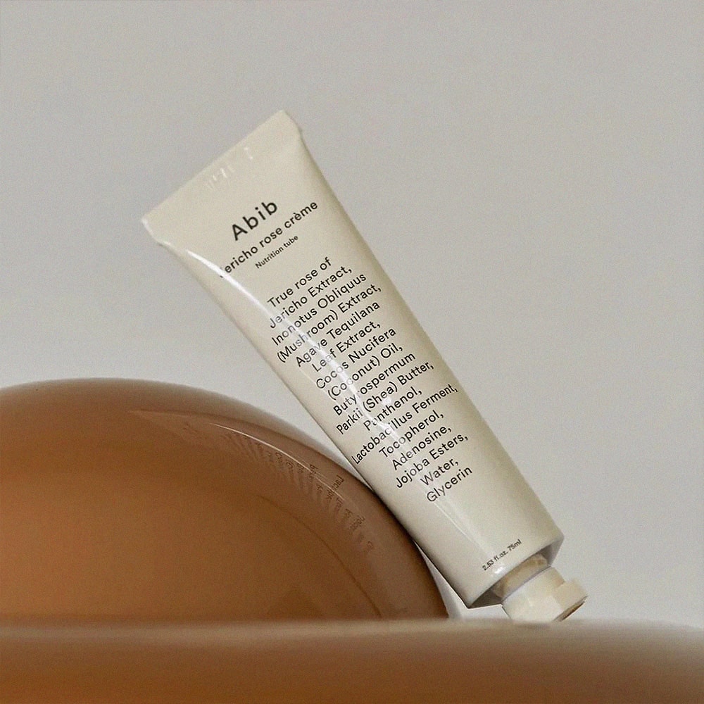 ABIB Jericho Rose Crème Nutrition Tube 75ml, crème rose posée sur fond clair, produit beauté ABIB.