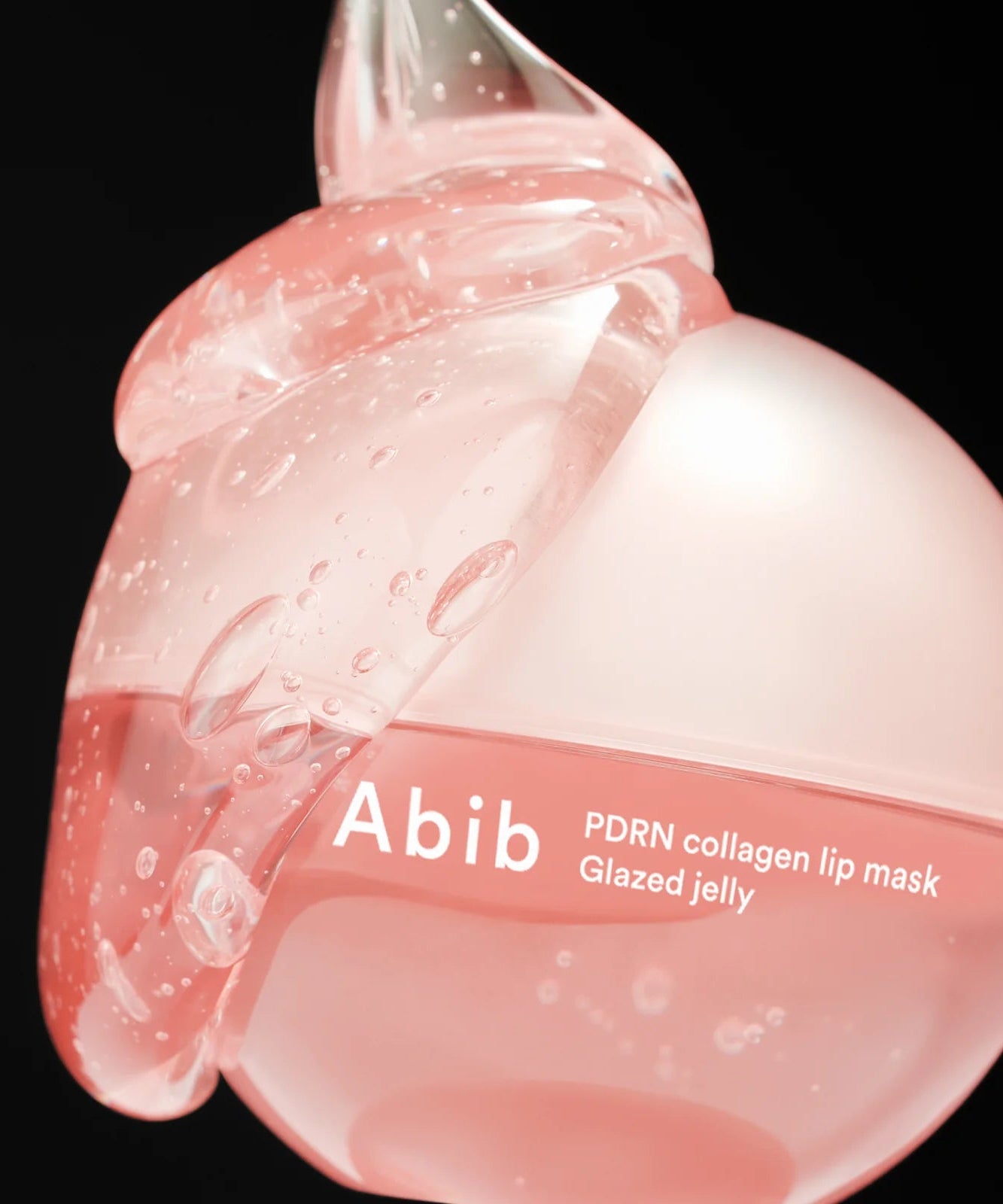 ABIB PDRN Collagen Lip Mask Glazed Jelly 11g dans un flacon rose translucide élégant avec texture gélifiée.