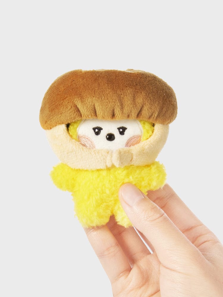 BT21 CHIMMY mini minini VEGGIE DOLL : peluche Jimin BTS, petit chiot mignon aux textures douces, tenue en main sur fond clair.