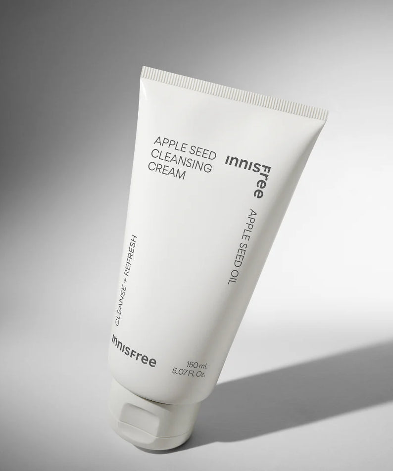 INNISFREE Apple Seed Cleansing Cream 150ml : tube crème nettoyante INNISFREE sur fond clair, lumière douce.