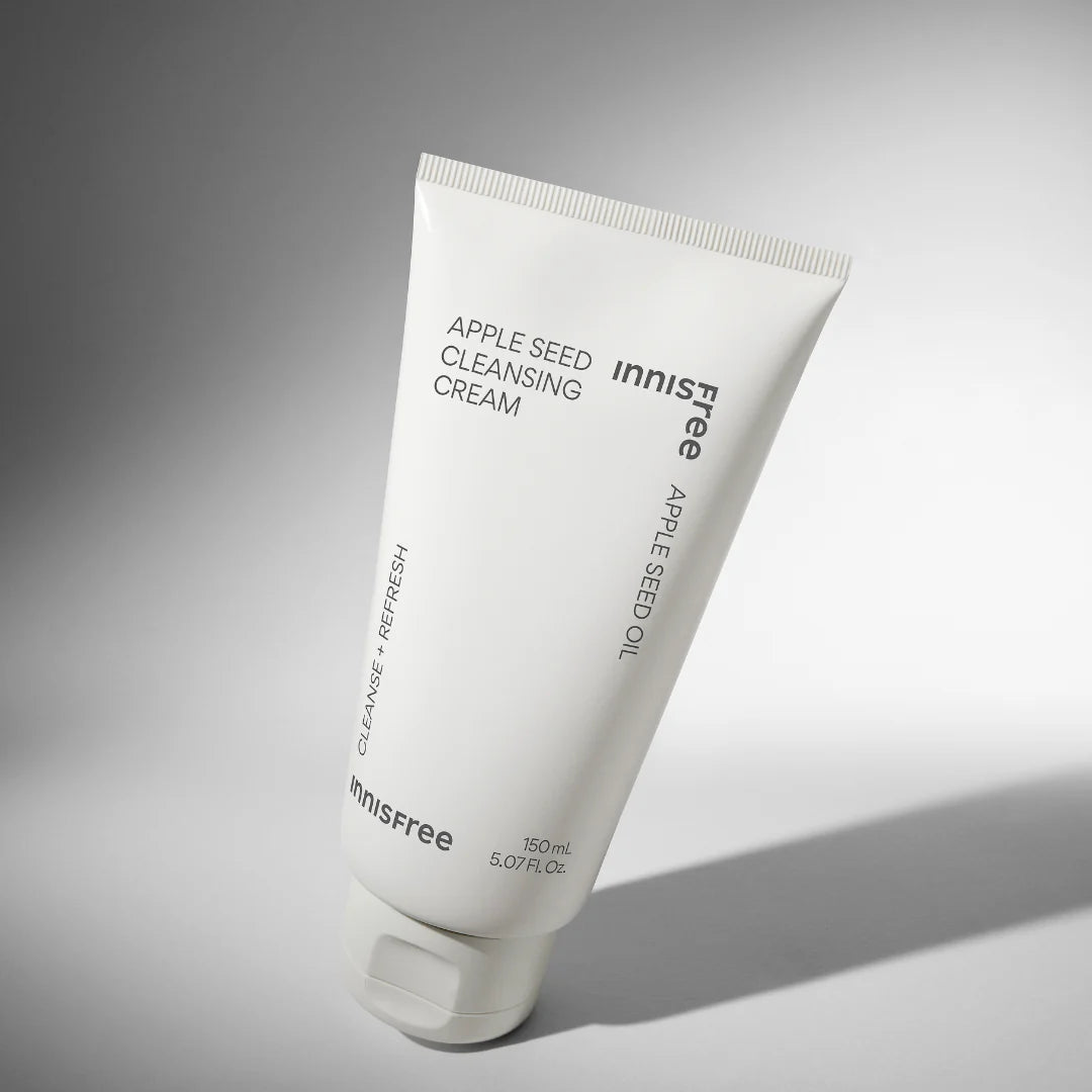 INNISFREE Apple Seed Cleansing Cream 150ml : tube crème nettoyante INNISFREE sur fond clair, lumière douce.